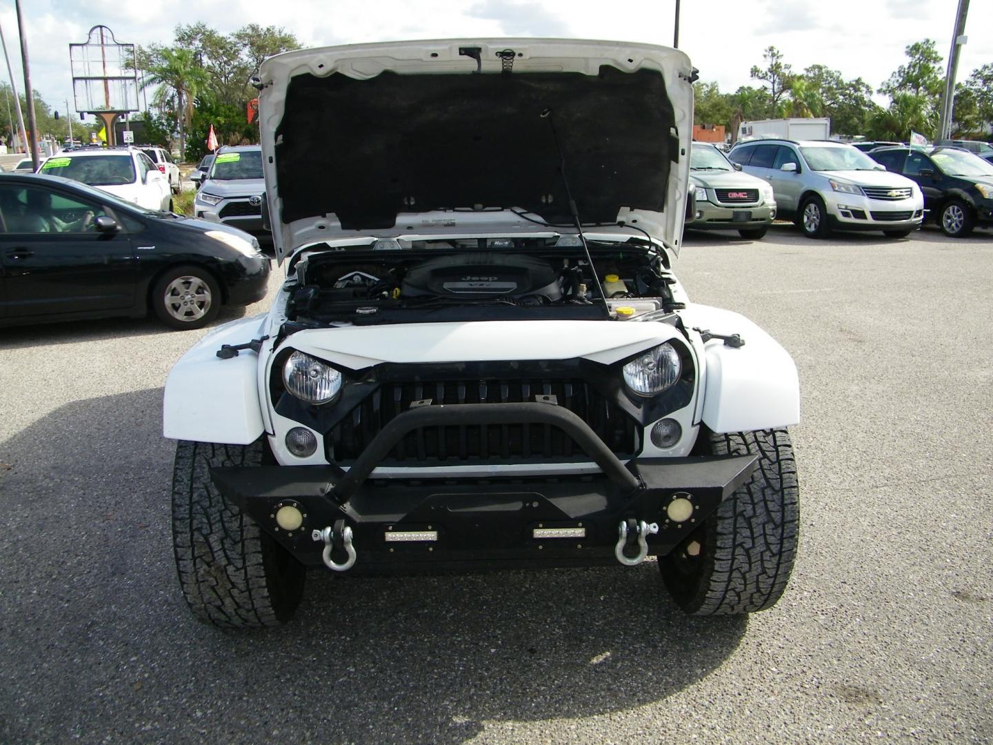 2015 White /Black Jeep Wrangler Unlimited Sahara 4WD (1C4BJWEGXFL) with an 3.6L V6 DOHC 24V FFV engine, Automatic transmission, located at 4000 Bee Ridge Road, Sarasota, FL, 34233, (941) 926-0300, 27.298664, -82.489151 - Photo#8